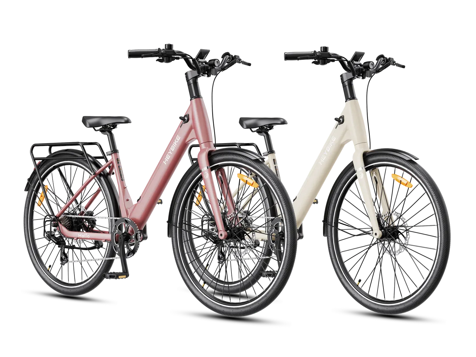 Deux Heybike Helio U, rose et blanc crème, vus de profil avec leur porte-bagages arrière